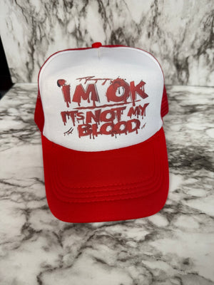 “I’m OK it’s not my blood” Foam Trucker Hat